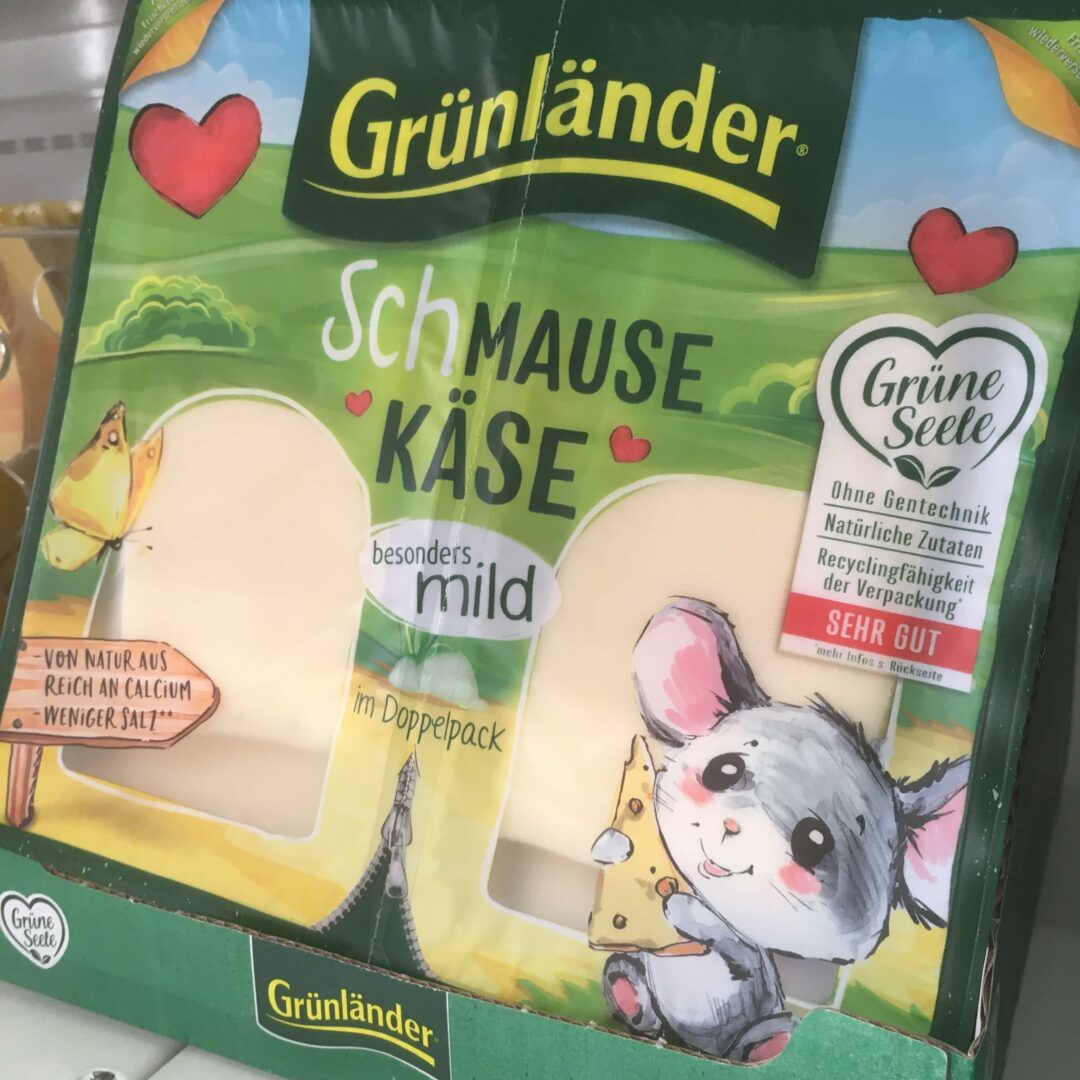 "Schmause Käuse" und eine daneben abgebildete niedliche Maus sollen Käsekonsum verniedlichen und legitimieren